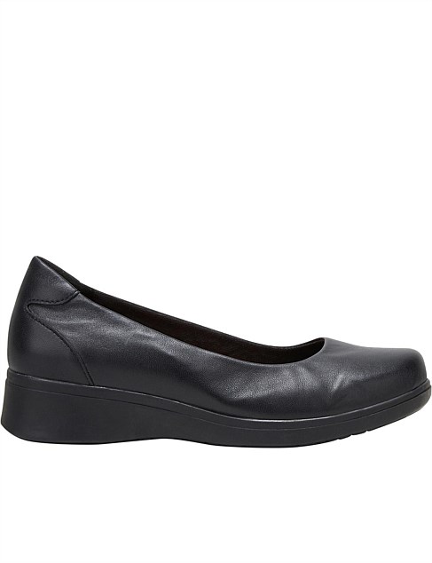 all black crocs with fur